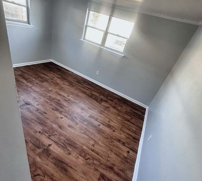 Bedroom with window in a 2-bedroom Metairie home