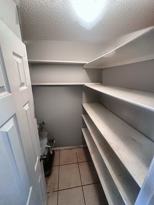 Storage room with shelves in a 1-bedroom New Orleans East home