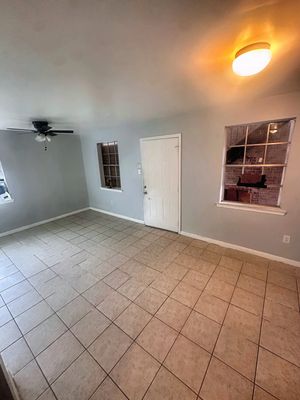Living area with tile floor in a 1-bedroom New Orleans East home