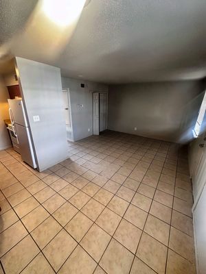 Living area with tile floor in a 1-bedroom New Orleans East home